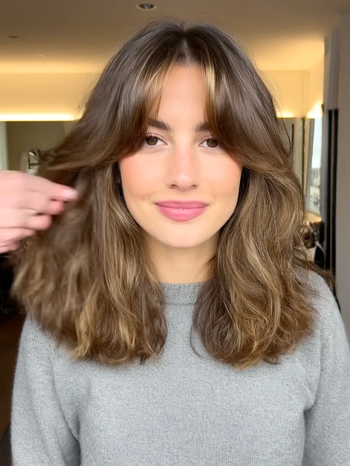 Bouncy Shoulder-Length Layers with Honey Brown Balayage